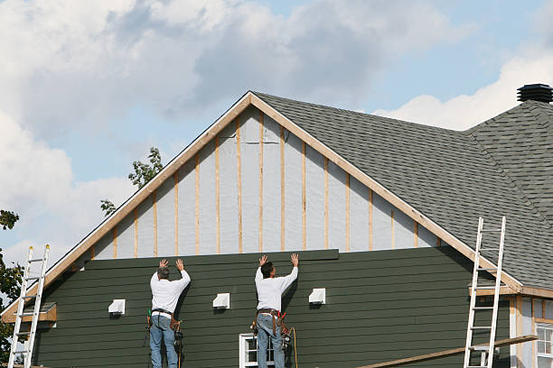 Professional Siding Replacement technician working in Baldwin, MD